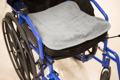 Small PeapodMat as a wheelchair protector